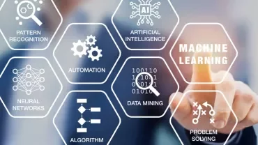 A person interacts with a digital panel about machine learning and AI concepts.