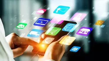 Person using a smartphone with floating app icons.