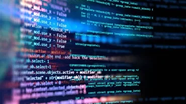 Colorful lines of computer code on a black background.