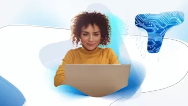Woman at computer with Talent Trends backdrop