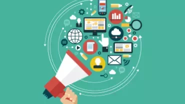 Hand holding megaphone with digital icons surrounding it