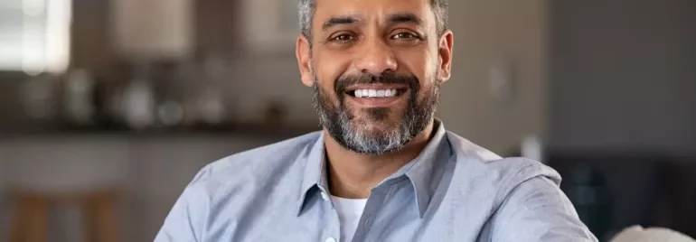 Smiling male professional in a modern office