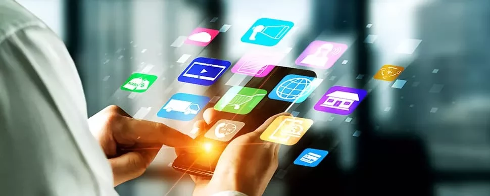 Person using a smartphone with floating app icons.