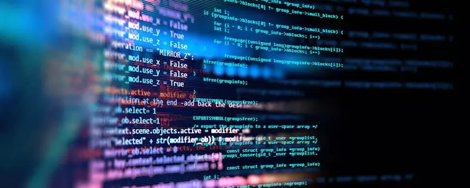 Colorful lines of computer code on a black background.