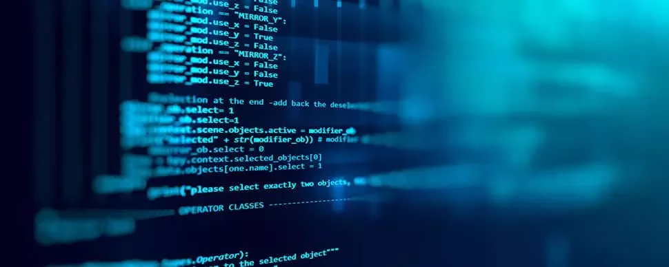 Close-up of computer code on a blue screen.